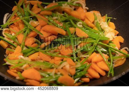 Preparing Recipe Sesame Beef Wok, Minced Summer Vegetables, France