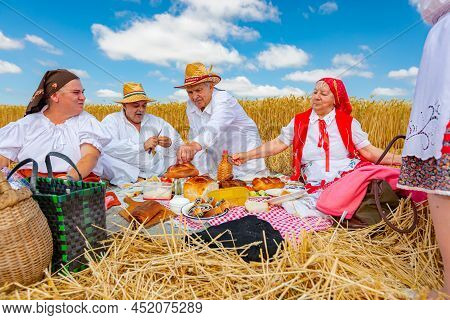 Muzlja, Vojvodina, Serbia, - July 03, 2021; Xxxviii Traditionally Wheat Harvest.
Traditional Meal, B