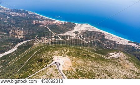 A Road Go Down Between The Albanian Mountains
