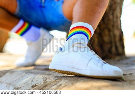Close Up Of Rainbow White Socks And Choes Outdoors