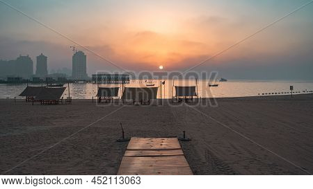 Doha, Qatar - March 03,2022 :beautiful Katara Beach During The Early Morning With Mist In The Backgr
