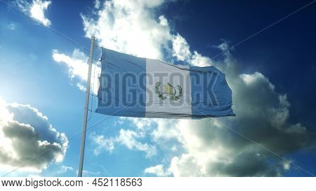 Flag Of Guatemala Waving At Wind Against Beautiful Blue Sky. 3d Illustration