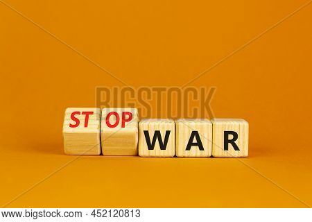 Stop War Symbol. Turned Cubes And Changed Concept Words War To Stop War. Beautiful Orange Table Oran