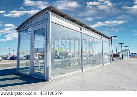 A Public Transit Bus Shelter At A Municipal Transfer Station For Urban Commuters In Airdrie Alberta 