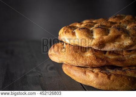 Ramadan Pita (ramazan Pidesi). Traditional Turkish Bread For Holy Month Ramadan. Side View And Copy 