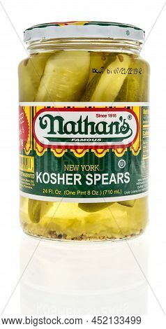 Winneconne, Wi -1 April 2022: A Package Of Nathans Famous New York Kosher Pickle Spears On An Isolat