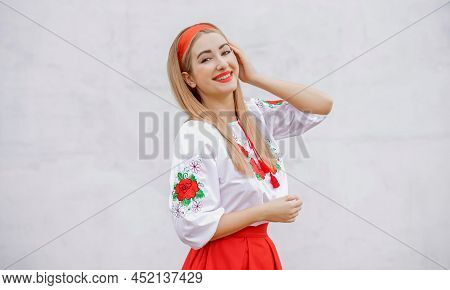 European Folk Fashionable Woman In Embroidery Traditional Shirt. Concept Of National Costume