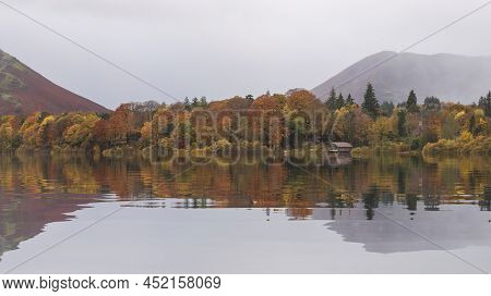 Epic Landscape Image Of Catbells Viewed Acros Derwentwater During Autumn In Lake District With Mist 