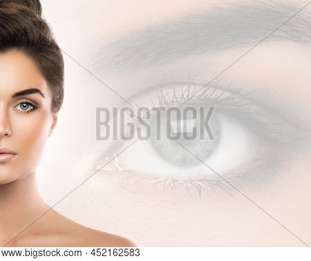 Beautiful Woman And Eye Closeup On Background