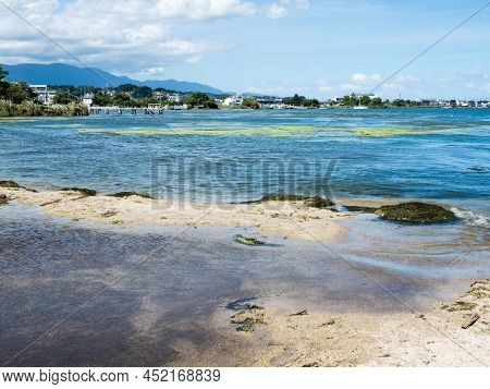 Scenic View From The Shores Of Lake Biwa At Sakamoto Castle Ruins Park In Otsu, Japan