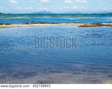 Scenic View From The Shores Of Lake Biwa At Sakamoto Castle Ruins Park In Otsu, Japan