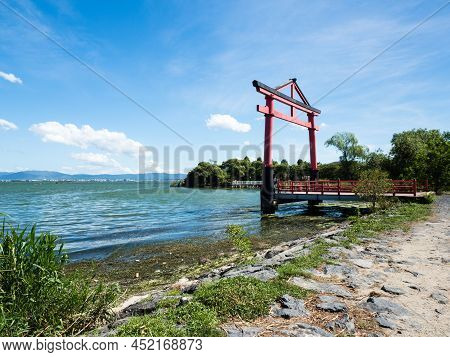 Red Torii Gates Of Hichihon Yanagimiya Shrine At Sakamoto Castle Ruins Park In Otsu, Japan