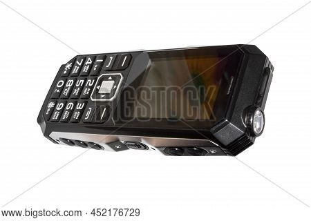 Mobile Shockproof Phone On A White Background.shockproof Push-button Mobile Phone With A Powerful Ba