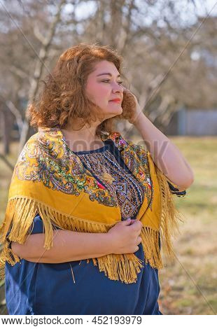 European Plus Size Ethnic Woman In Embroidery Traditional Shirt And Scarf. Concept Of National Costu
