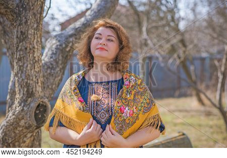 European Plus Size Ethnic Woman In Embroidery Traditional Shirt And Scarf. Concept Of National Costu