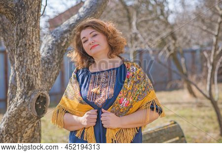 European Plus Size Ethnic Woman In Embroidery Traditional Shirt And Scarf. Concept Of National Costu