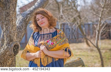 European Plus Size Ethnic Woman In Embroidery Traditional Shirt And Scarf. Concept Of National Costu