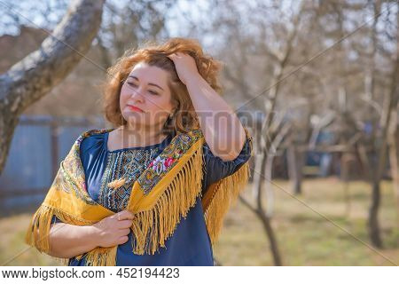 European Plus Size Ethnic Woman In Embroidery Traditional Shirt And Scarf. Concept Of National Costu