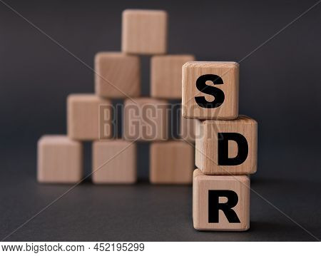 Sdr (special Drawing Rights) - Acronym On Wooden Cubes On A Dark Background. Internet Concept
