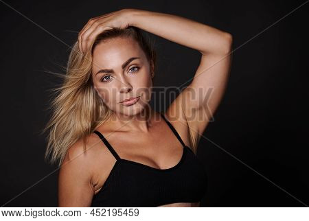 Confident Beautiful Fitness Young Caucasian Woman With A Healthy Toned Body, Clean Glowing Tanned Sk