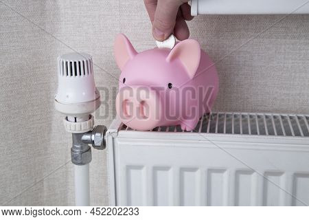 Heating Battery. Gas Heating Of The Room.saving Heat And Paying For Heating.