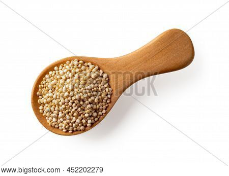 White Quinoa Seeds In A Wooden Spoon Isolated On A White Background. White Quinoa Seeds For Gluten F