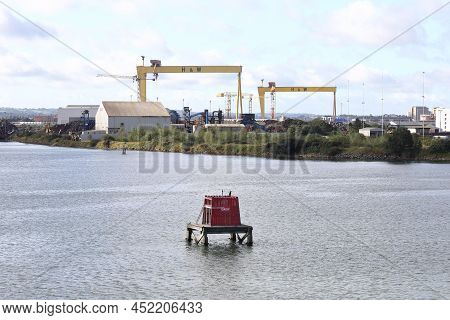 Belfast, Northern Ireland - September 19:  The Cranes Of Harland And Wolff Shipyard Adorn Belfast Ha