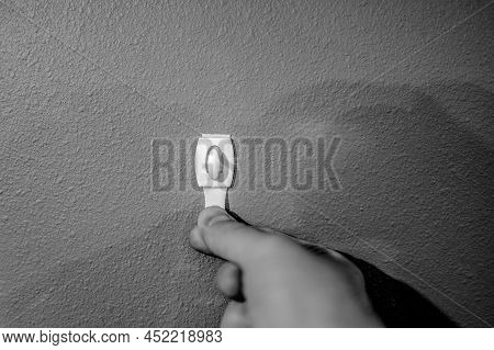 Selective Focus On Adhesive Strip Wall Hanger That Can Be Removed By Pulling Tape