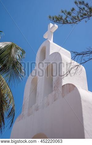 Steeple Of The Capilla De Nta Señora Del Carmen On 5th Avenue In Playa Del Carmen.