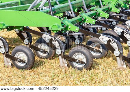 A Multi Row Knife Harrow With Loosening Knives For Mounting On A Tractor Against The Background Of Y