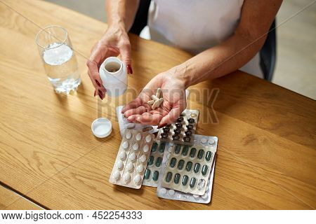 Senior Woman Take Daily Vitamins, Beauty Supplements