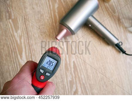 Pyrometer For Measuring Temperature. Measuring The Temperature Of A Technical Object With A Pyromete
