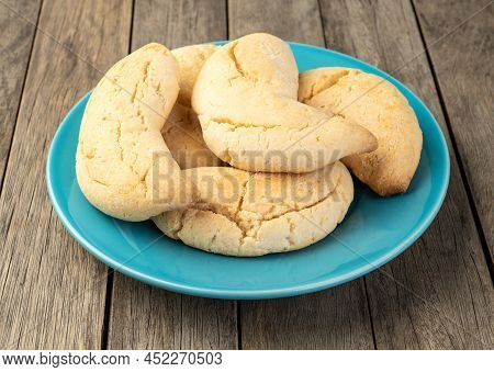 Chipas, Typical South American Cheese Bun Over Wooden Table.