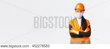 Covid-19 Safety Protocol At Enterpise, Construction And Preventing Virus Concept. Confident Asian Fe