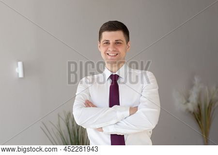 Portrait Of A Male Freelancer. Decentralized Work Of Digital Nomads, Hybrid Work Model.