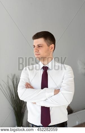 Portrait Of A Male Freelancer. Decentralized Work Of Digital Nomads, Hybrid Work Model.