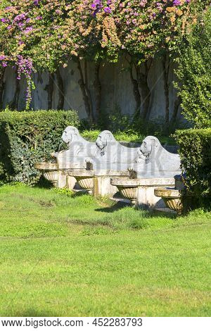 Rome, Italy - October 10, 2020: Villa Borghese Gardens, Portico Dei Leoni, Stone Lion Sculptures In 