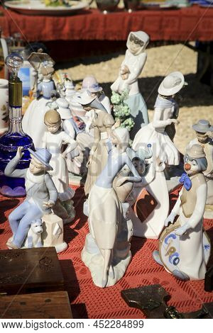Guardamar, Alicante, Spain- April 3, 2022: Lladro Porcelain Figurines For Sale At The Flea Market Ca