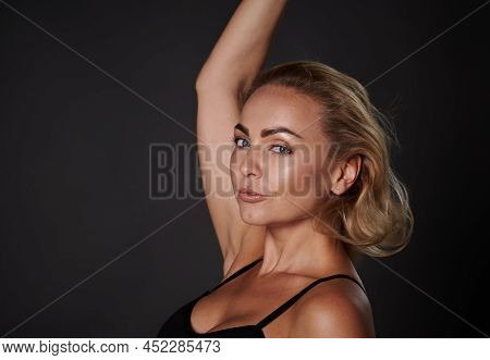 Close-up Side Portrait Of An Attractive Middle Aged European Woman Confidently Looking At Camera Iso