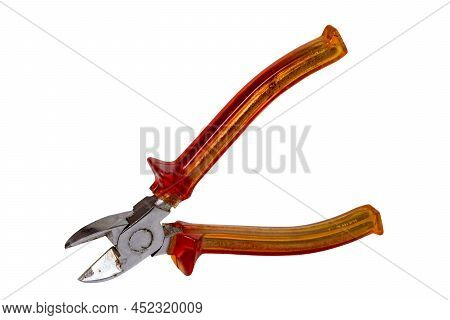 Closeup Of An Old Rusty Pair Of Cutting Pliers Or Side Cutters For Cutting Wire With Red Plastic Han