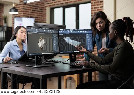 Diverse Asset Creators Optimising Polygon Count While Using Cad To Create Advanced Virtual Sketch. C