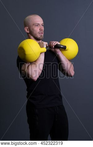 Guy With A Yellow Kettlebell Gym Anonymous Young Strength, In The Afternoon Fit Effort In Picking An