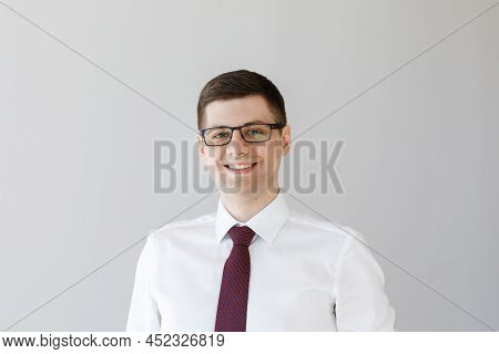 Portrait Of A Male Freelancer. Decentralized Work Of Digital Nomads, Hybrid Work Model.