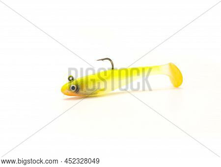 Single Jig Head Shad Soft Fishing Lure With Hook And Paddle Tail Swimbaits Isolated On White Backgro