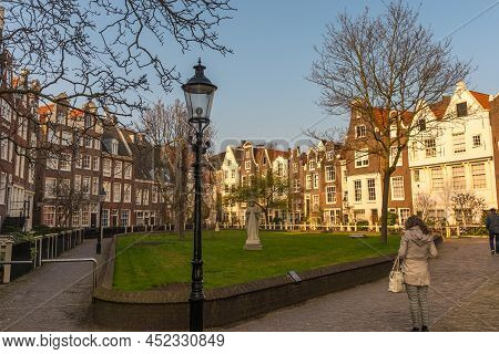 Amsterdam, Netherlands, March 2022. The Beguinage In Amsterdam With Historic Facades.