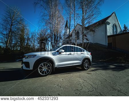 Minsk, Belarus-april 2022: Geely Tugella Car Against The Background Of The Church Of St. Matthew In 