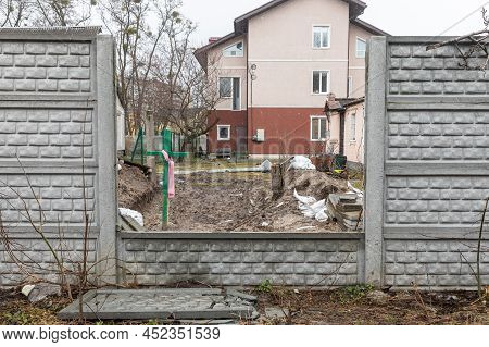 Bucha, Ukraine - Apr. 03, 2022: People Buried Their Dead Relatives And Neighbors In The Yards During
