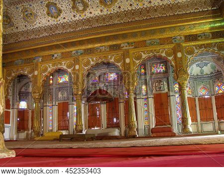Jodhpur, Rajasthan, India, August 14, 2011: Richly Decorated Hall With Stained Glass Windows And Gol