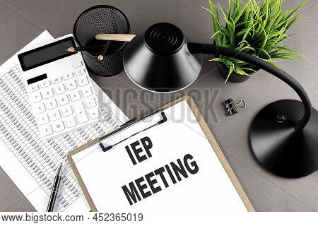 Clipboard ,chart And Calculator, Lamp And Workspace Accessories On A Grey Table. Top View , Iep Meet