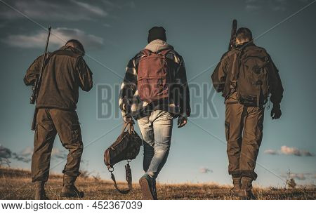 Hunters With Shotgun Gun On Hunt. Hunting In Russia.